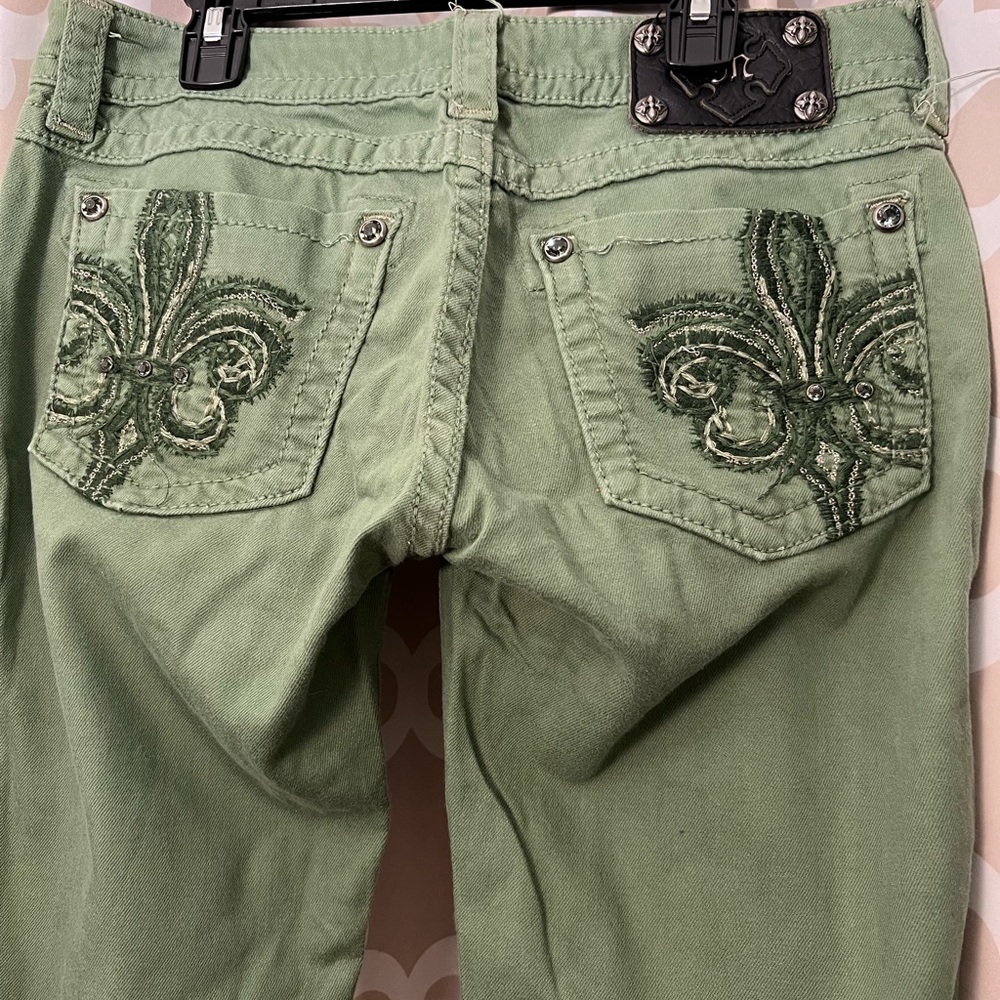 Women’s size 29 Miss Me “pine” colored skinny jeans